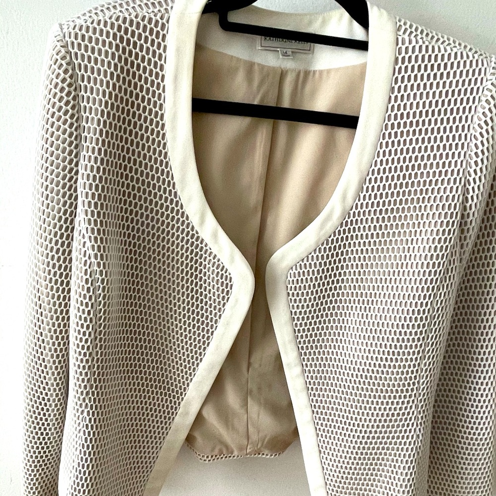 Cream and nude meshed blazer.
